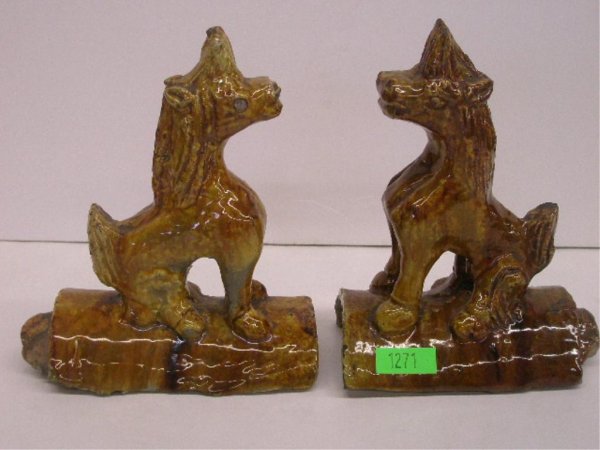 Pr Chinese Pottery Roof Tiles W/ Foo Dogs: Pr Chinese brown glazed Pottery Roof Tiles with sculptured Foo Dogs. 18th - 19th c., L 6 1/4", H 7 3/4", W 3 1/2"