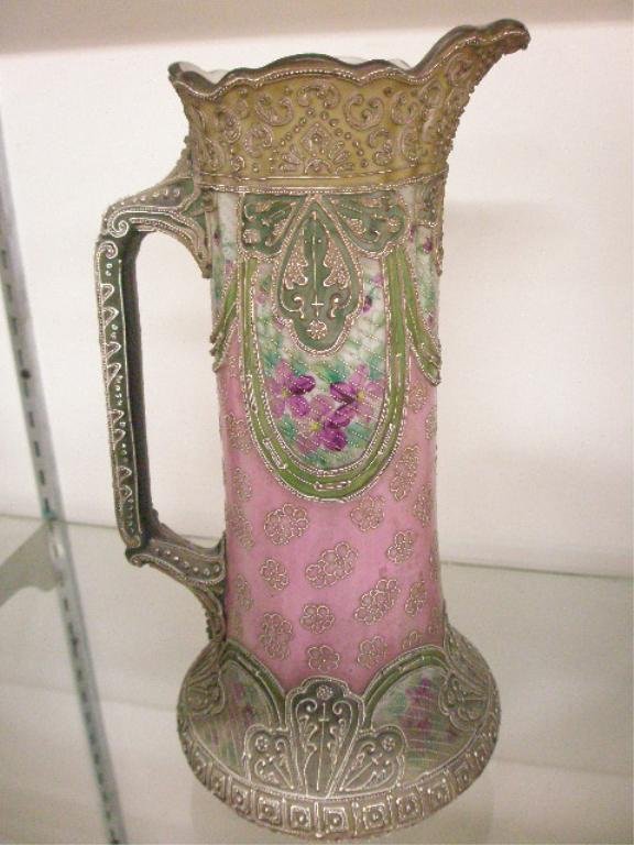 Nippon Moriage Tankard: Nippon (unmarked) Moriage tankard in pink & green w/overall floral & scroll raised work, late 19th c., hgt 13 1/2"