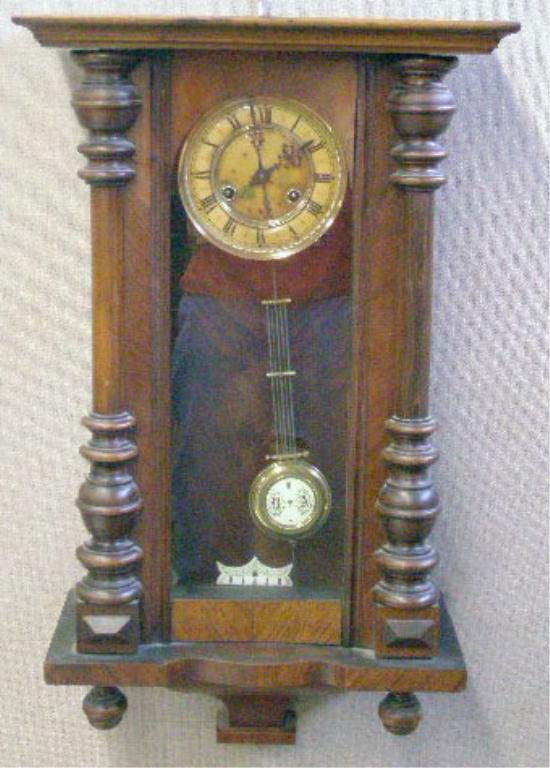 Wall Regulator Clock: Wall Regulator clock, walnut, celluloid dial, time & strike movement, brass & porcelain pendulum, late 19th c., 27" x 16" x 7 1/2" without crest