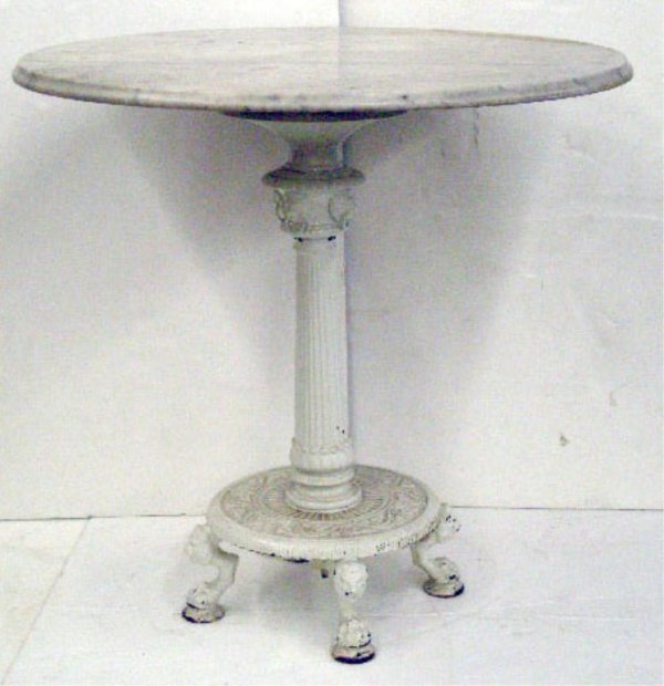 Victorian Cafe Table With White Marble Top: Victorian Cafe Table With White Marble Top over ornate cast iron base with lion feet; late 19th c.; H 30" Diam 31 1/2"