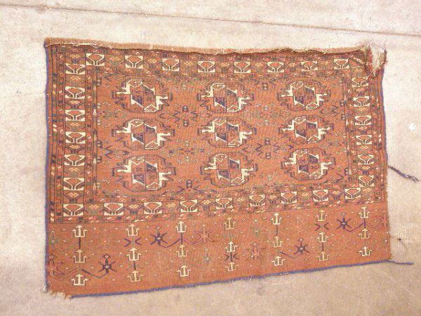 Antique Yomut saddle bag: Antique Yomut saddle bag, in cobalt, brick, cream & green geometric field with sampler side border, 48 1/2" x 31 1/2"