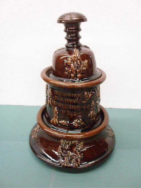Bennington Pottery Three Section Spittoon: 19th c. Bennington brown glazed pottery 12 1/2" three section spittoon w/relief floral design & inscribed "Henry Lawn Dewsbury 1880"