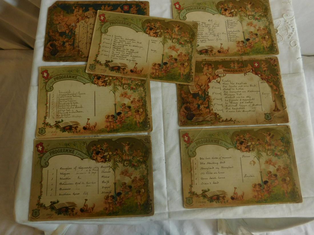 7 Antique Music Box Program Cards: Seven Antique Music Box Program Cards, Champenois Paris - Marque De Fabrique, all color illustrated with putti musicians; each with hand inked music selections, 8 1/4" x 5 1/2". CONDITION: Some with f