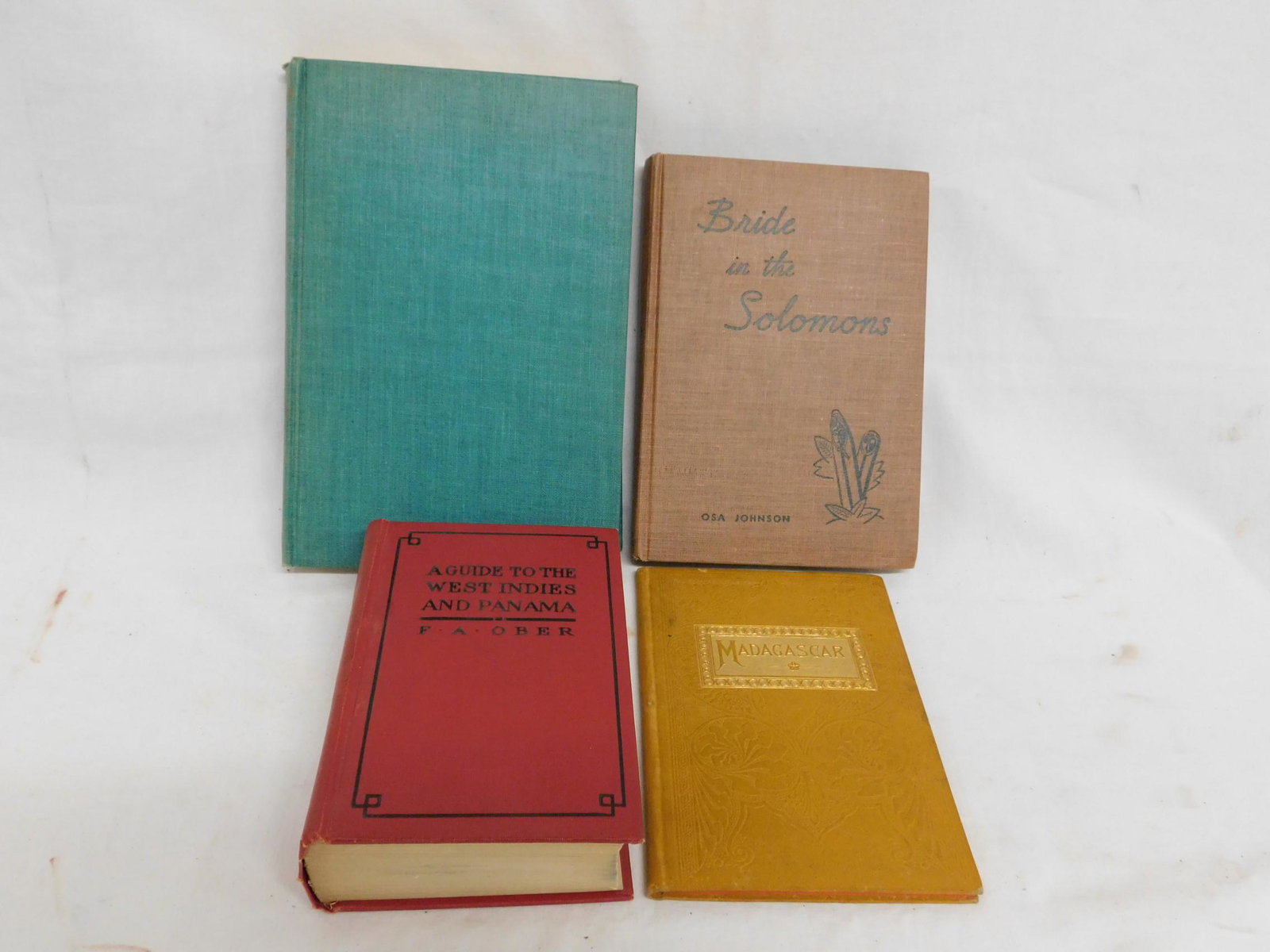 4 Vintage Island Books: Four Vintage Island Books, includes: "Madagascar" by Gen. J.W. Phelps, John B. Alden published 1885; "Four Years in Paradise" and "Bride in the Solomons" by Osa Johnson, Garden City Publishing Co.1941