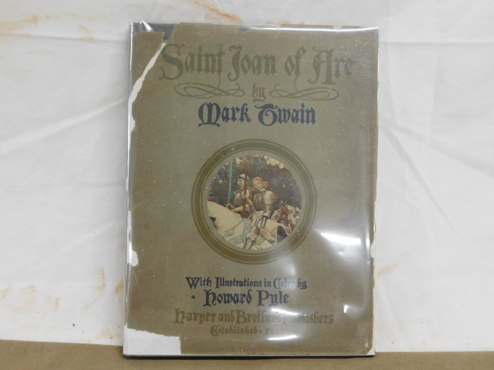 Twain, Mark, & Pyle, Howard (illustrated), Saint J: Twain, Mark, & Pyle, Howard (illustrated), Saint Joan of Arc, Harper & Brothers, New York, 1919. First edition, with front is and three plates in text all tipped in. Endpapers printed in green, with o