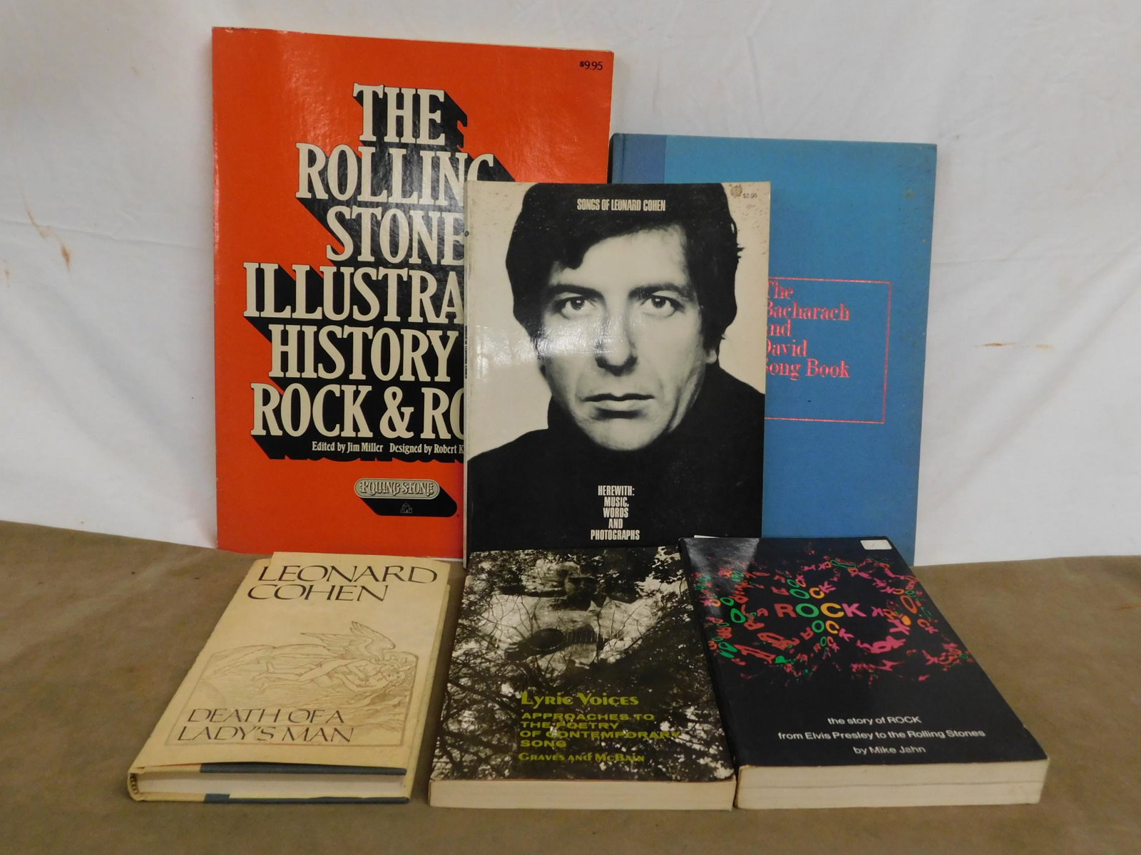 Cohen Leonard Books: [6 items] A group of music-related titles, including two books by singer/songwriter/poet Leonard Cohen, consisting of: Bacharach, Burt, The Bacharach and David Song Book, Simon and Schuster, New York,