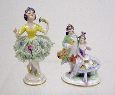 German Porcelain Figures: Volkstedt German porcelain 4" lace dress figure w/applied flowers & German porcelain double cross swords mark 3 1/2" courting scene figure.
