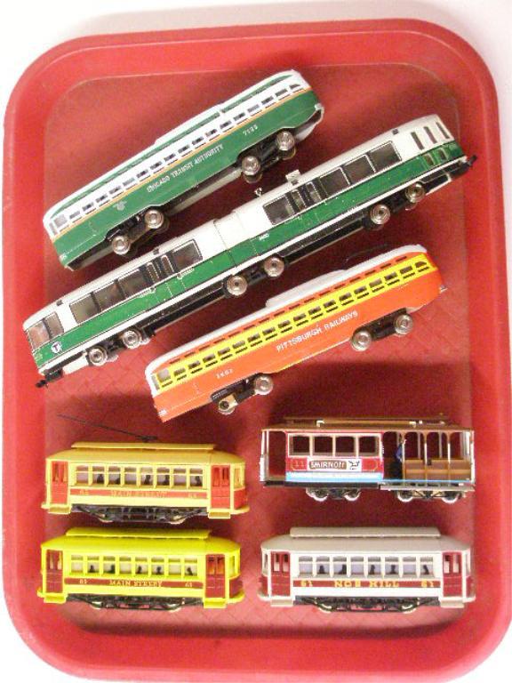 HO Scale Trolley Cars & Buses: Seven assorted HO scale trolley cars &buses, (2) unmarked #65 Main Street & #61 Nob Hill trolley cars, Bachman #11 Powell & Hyde Sts. trolley car, Bachman #1461 Pittsburgh Railways & #1123 Chicago Tra