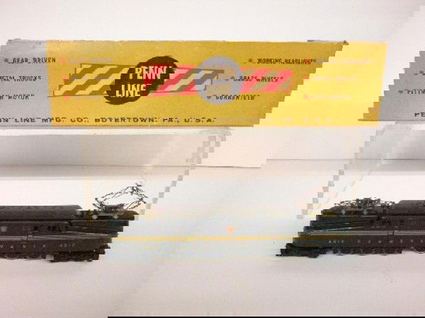 Penn Line HO Pennsylvania GG1 Engine: Penn Line HO scale #4917 Pennsylvania GG1 engine w/box. CONDITION: Areas of wear & box has wear & tearing.