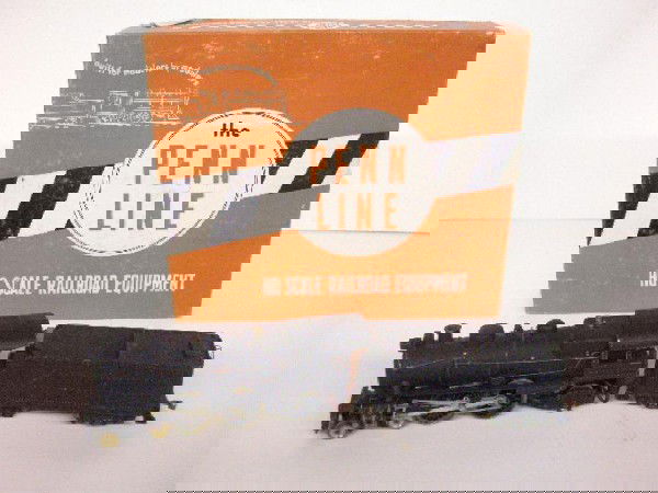 Penn Line HO Scale Locomotive & Tender: Vintage Penn Line HO scale E-6 Atlantic locomotive & tender w/box. CONDITION: Areas of paint loss & rust, box has wear & tearing & detached piece over wheel.