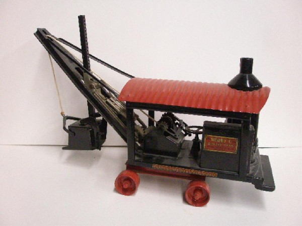 Buddy L Pressed Steel Steam Shovel: 1920's Buddy L pressed steel Improved Steam Shovel. CONDITION: Professionally repainted, replaced decals & areas of paint loss.