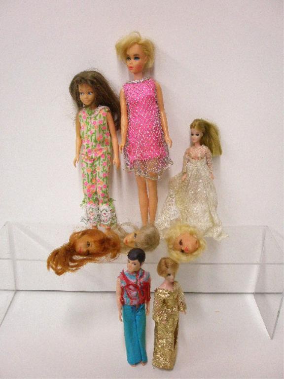 1960's Barbie Dolls: Five 1960's Barbie & Barbie related large & small size dolls & three doll heads. CONDITION: All have some form of wear.