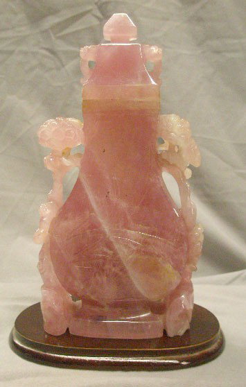 Chinese rose quartz covered urn: Chinese rose quartz covered urn w/opium blossom carved handles, mid 20th C., 10 1/2" height. [77]