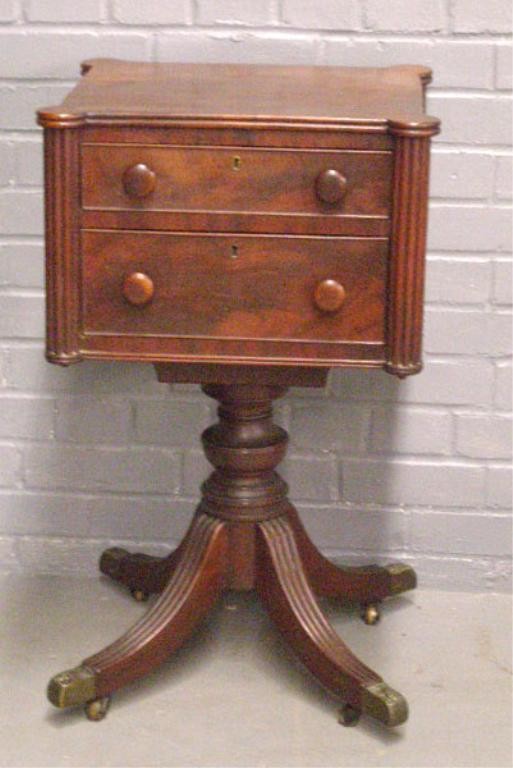 Baltimore Empire Sewing Stand: Empire mahogany sewing stand, reeded turret case corners, beaded drawers with locks. Urn pedestal with reeded splayed legs, eagle brass caps. Probably Baltimore, but possibly Philadelphia, C. 1830 [Pr