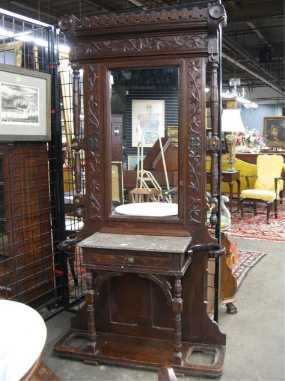 Victorian Hall Rack: Victorian Hall Rack, walnut, elaborate foliate, rosette & scalloped carvings, brass hardware, marble top, late 19th c., 40 1/2" x 82".