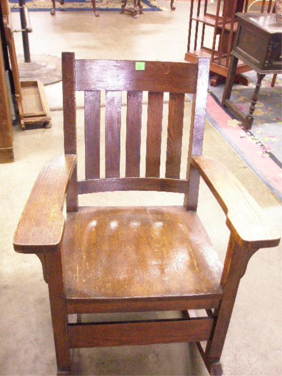 Mission Oak Rocker and armchair: [2 pc] Mission oak rocker; together with a Mission oak armchair, American, early 20th c.