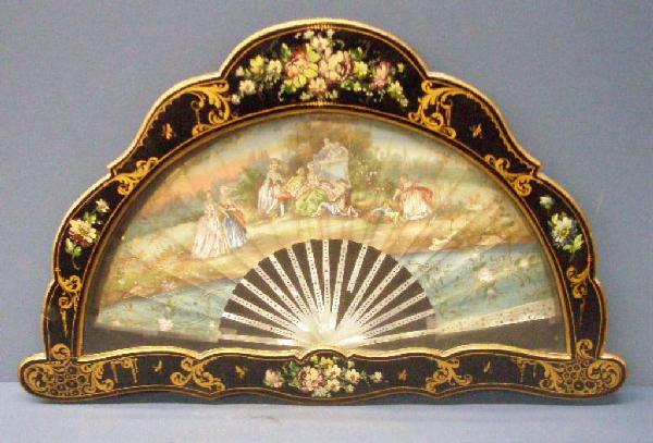 19th c. Framed Hand Painted Ladies Fan: Late 19th c. Mother of Pearl handled hand painted ladies hand fan w/courting scene, mounted in 16 1/2" x 26 1/4" shadow box frame w/hand painted floral design
