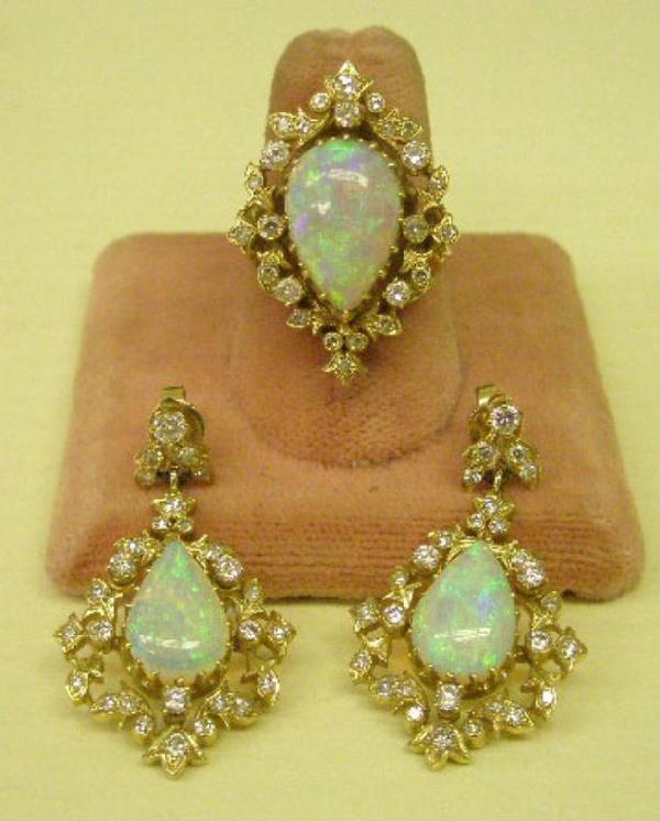 14k Yellow Gold & Opal Earring Set: 14k yellow gold & opal earring set, fiery pear shaped opals - 12 & 14mm length, 1+ ct TW round cut diamonds. Ring Size 6 1/4, earrings 1 1/2" length. Total 10.6 DWT. [5]