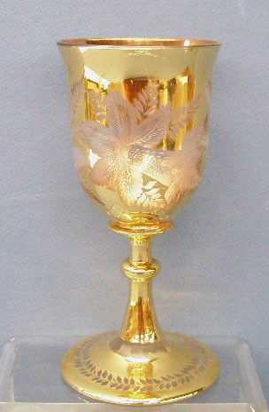 Bohemian Glass Chalice: Bohemian glass 8 1/4" chalice, gilt crystal w/intaglio cut floral design, paper label on base