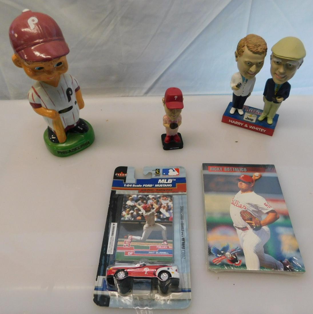 Asst Lot Bobble Head, Cards: Asst Lot of Bobble Head, Cards, Phila bank, Harry and Whitey, Bobble Head, Phillies Jim Thome Bobble Head, pack Phillies baseball card, Ford Mustang with trading cards, no boxes. CONDITION: packages a