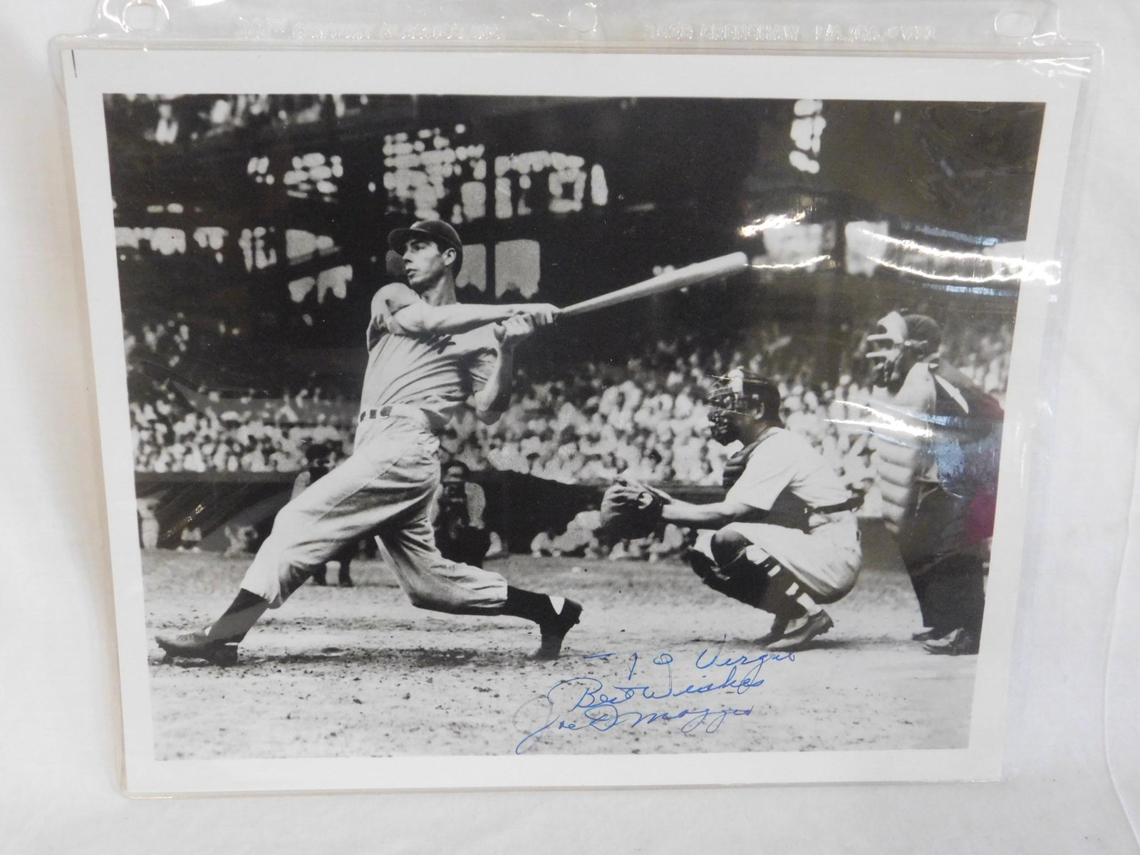 Joe Di Maggio - Autographed Photo: Joe Di Maggio - Autographed Photo, 8" x 10", black and white, Joe at Bat, signed in ink at bottom "To Virgil - Best Wishes, Joe DiMaggio." Note: Although Estate source is reliable, we cannot guarantee