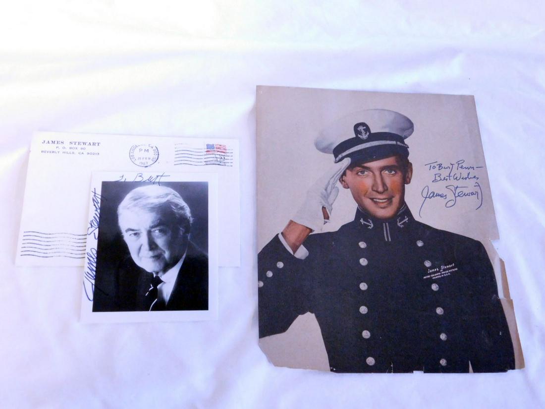 Autographed Jimmy Stewart Items: Autographed Jimmy Stewart Items, including: black and white photo, 4" x 5" with James Stewart envelope, stamped and port marked, plus colorized, 8" x 10" MCM publicity photo. CONDITION: Bottom edge of