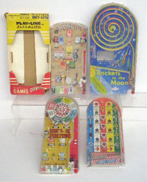 1960's Wolverine & Marx Pinball Games: Four 1960's bagatelle style pinball games, Wolverine Supply & Mfg. Co Rockets To The Moon & Louis Marx Co., Inc. Wheel of Fortune, Scores N'Stripes & Pop-A-Puppet w/box.
