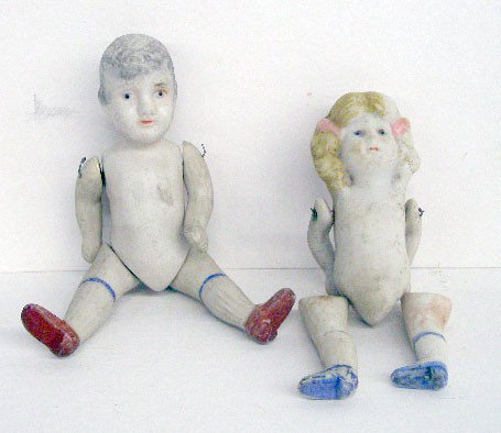 1930's Nippon Bisque Dolls: 1930's Nippon full bisque 5" boy & girl dolls, jointed arms & legs, painted hair, eyes, lips & shoes.