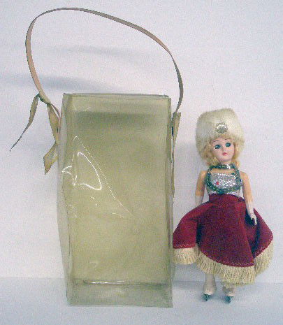 1950's Ice Capades Souvenir Doll: 1950's Ice Capades souvenir 8" hard plastic skater doll w/sleep eyes & plastic carrying case.