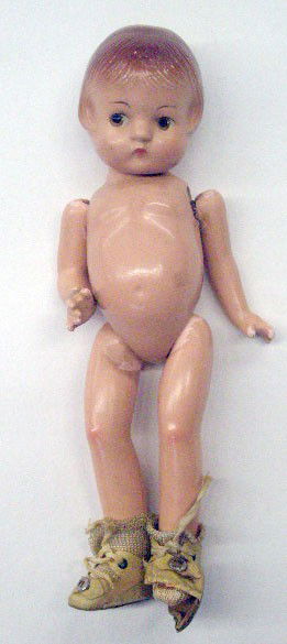1930's Effanbee Patsyette Doll: 1930's Effanbee 9" composition Patsyette doll, painted eyes, molded hair, jointed arms & legs, original shoes & socks.