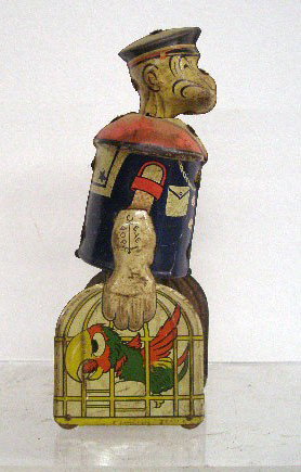 Max Tin Wind-Up Popeye w/Parrot Cages: 1930's Louis Marx Co. Inc. lithographed tin wind-up 8 1/4" Popeye w/Parrot Cages.