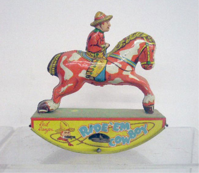 Wyandotte Tin Wind-Up Red Ranger Ride Em Cowboy: 1950's Wyandotte Toy Company lithographed tin wind-up 6 1/4" Red Ranger Ride Em Cowboy.