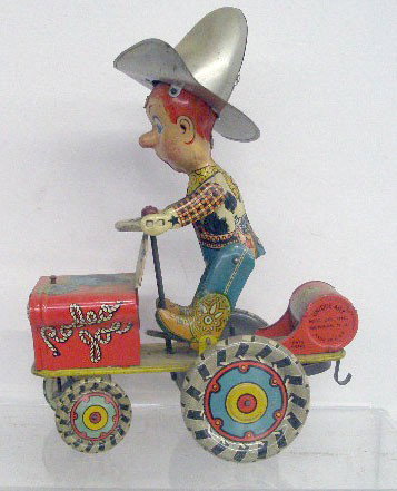 Unique Art Tin Wind-Up Rodeo Joe Crazy Car: 1940's Unique Art Manufacturing Company lithographed tin wind-up 7" Rodeo Joe Crazy Car.