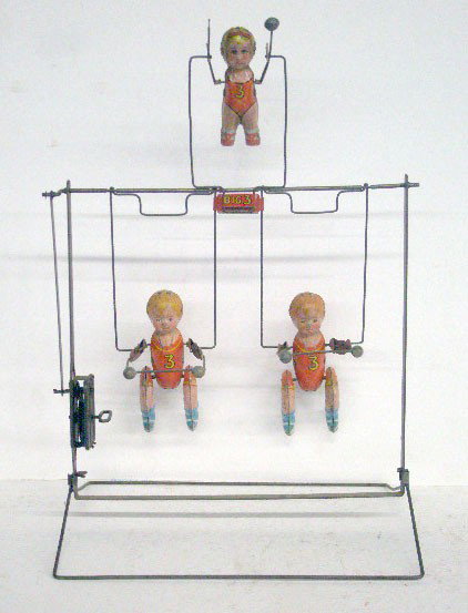 Marx Tin Wind-Up Big 3 Aerial Acrobats: 1920's Louis Marx Co. Inc. lithographed tin wind up 12" Big 3 Aerial Acrobats.