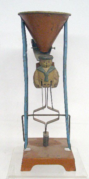 1920's German Tinplate Sand Toy: 1920's German lithographed tinplate 11 1/2" Hod Carrier sand toy.