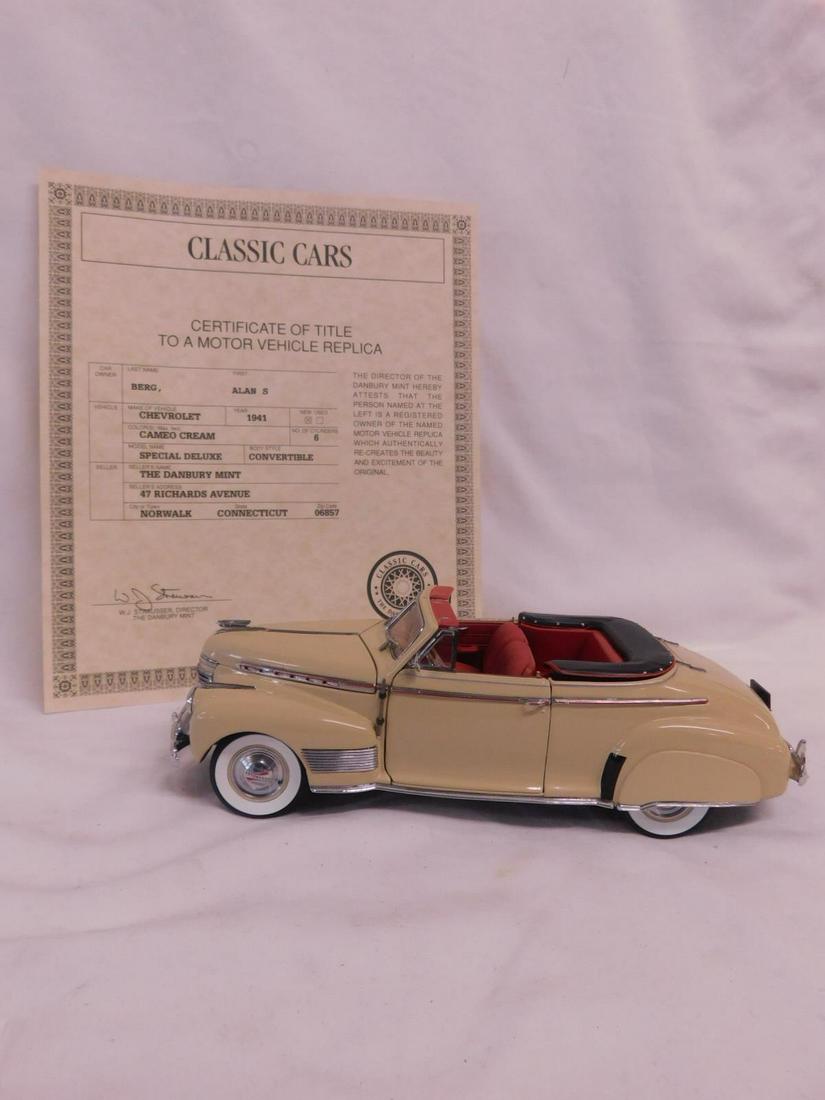 1941 Chevrolet: 1941 Chevrolet, The Danbury Mint Special Deluxe, convertible, 1:24 scale, cameo cream, with C.O.T. No Box. CONDITION: Used, minor wear. AS-IS.