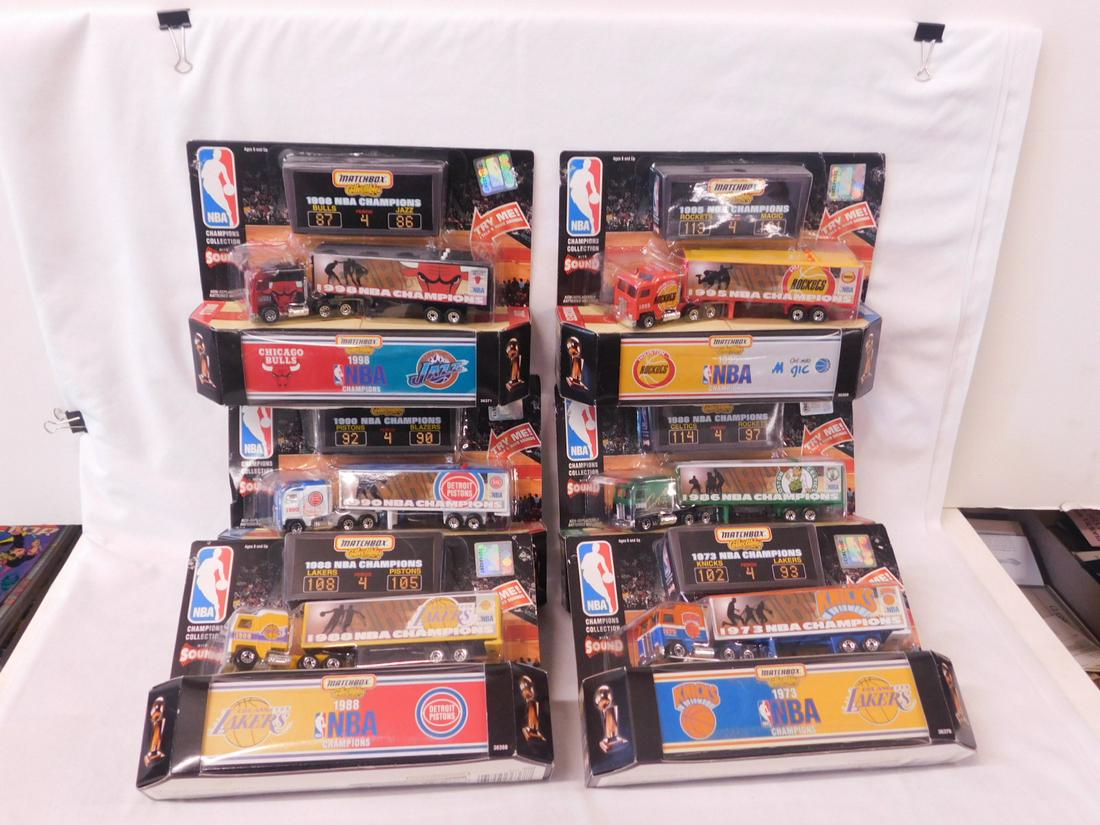 Matchbox NBA Champions Collection NIP: Matchbox NBA Champions Collection, complete set of six, new old stock, all tractor trailers with Champions logos in pack with scoreboard and box, all with sound including: 1973 Champions NY Knicks, 19