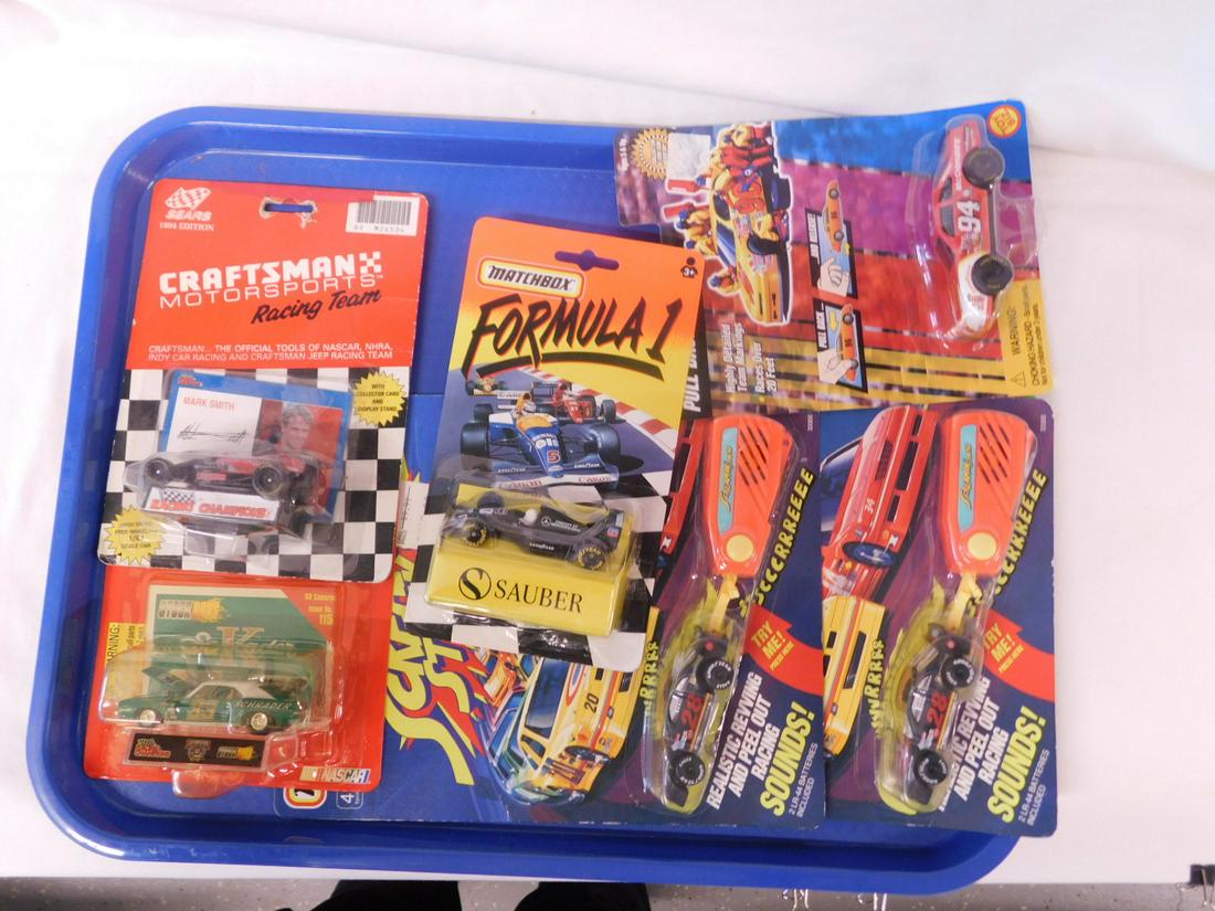 Matchbox & Other Nascar Vehicles NIP: Matchbox and Other Nascar Vehicles, new old stock, scale model including: Matchbox formula 1, Sauber, 1994, Screamin" Stocks - two 33300, #28 Davey Allison, 1992, Sears 1994 Edition Craftsman Motor Sp