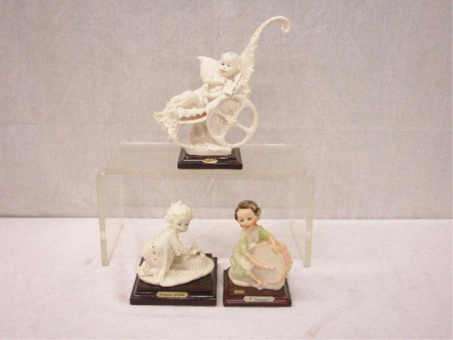 Giuseppe Armani Children Figures: Group of three Florence Studio Giuseppe Armani children figures, 3" First Birthday (1986), 7" First Ride (1986) & 4" seated child w/drum (1987).
