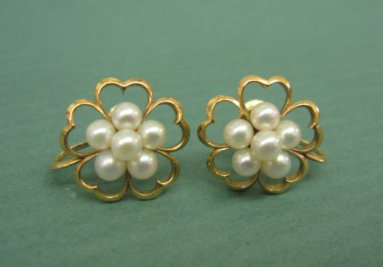 Pr. 14k Mikimoto Pearl Earrings: Pr. 14k Mikimoto pearl earrings, screw back, clover shaped with cluster of five 4mm pearls in each, marked k14 & "m" in clam. 5/8" across.