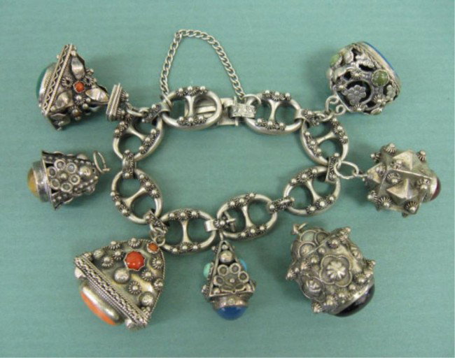 Silver Etruscan Fob Bracelet: Silver Etruscan fob bracelet, large Gucci style links with bead & wirework designs, 7 asst fobs (1 unattached) set with carnelian, chrysoprase, tiger eye, amethyst, turquoise, etc. Unmarked but tests 