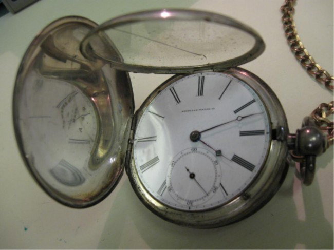 American Watch Co. P.S. Bartlett Pocketwatch: American Watch Co. P.S. Bartlett pocketwatch, hunter case, movement #33382, case marked A49, Waltham, Mass, tests as silver, unmarked jewels, keywind w/key & 13" gf chain , runs, cracked crystal.