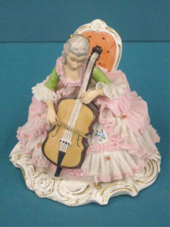 German Porcelain & Lace Dress Figure: Willi Rittirsch Kups German porcelain pink & white lace dress seated female w/cello 5 3/4" x 6 1/4" x 5 1/2" figure (sections of lace loss)