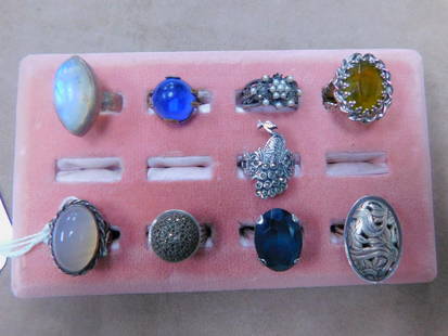 9 Assorted Silver Rings: Nine Assorted Silver Rings, in 800 and sterling silver, all different with moonstone, blue stones, topaz, marcasites and pearls. [T] CONDITION: Good, used, cond.