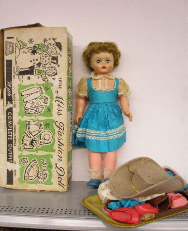 1950's Deluxe Reading Little Miss Fashion Doll: 1950's Deluxe Reading Corp.19 1/2" hard plastic & vinyl Little Miss Fashion Doll w/ 4 complete outfits & original box, sleep eyes & closed mouth. Condition: Doll is very good with minor wear & dirt re