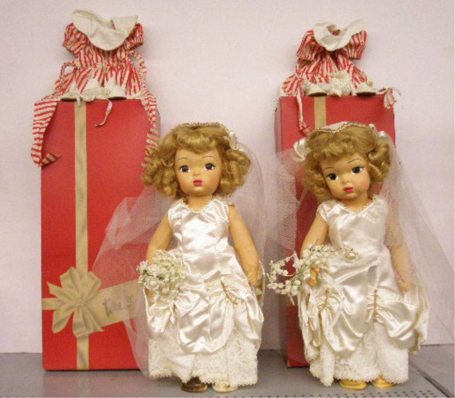 1950's Terri Lee Hard Plastic Terri Dolls: Two 1950's Terri Lee Doll Company 16" hard plastic #1100 Terri bride dolls with extra outfits & original boxes. Condition: Dolls are very good with minor wear, staining & wear on clothing, boxes have 