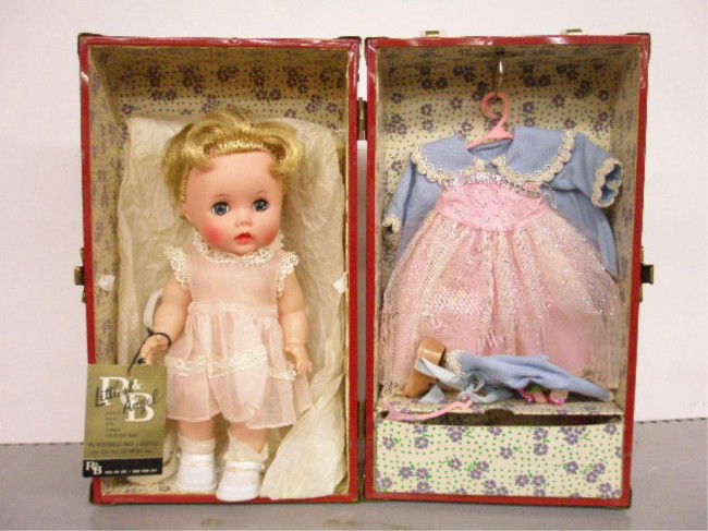 1950's R&B Littlest Angel Doll: 1950's R&B Doll Company 10" vinyl & hard plastic Littlest Angel doll with metal trunk form case, extra accessories, sleep eyes, open mouth. Condition: Doll is very good, with minor wear, accessories &