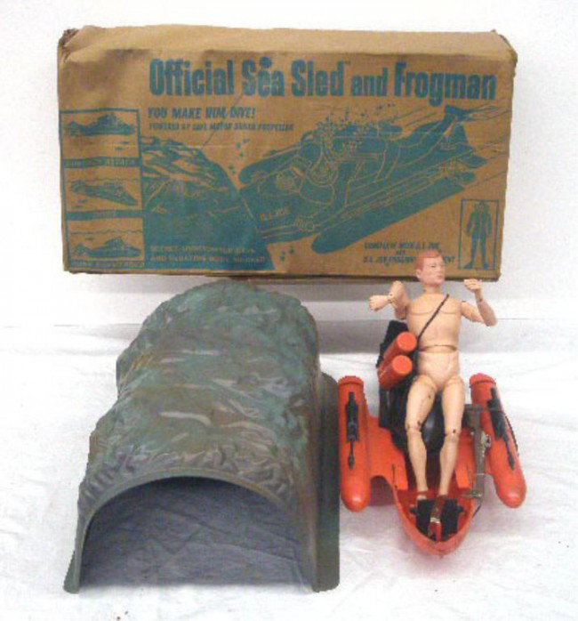 1966 G.I Joe Sea Sled and Frogman: 1966 Hasbro Industries Inc., G.I. Joe Official Sea Sled and Frogman set w/original box. Condition: No outfit for doll, doll has wear & staining, missing 1 flipper, sled has wear, box has wear & tearin