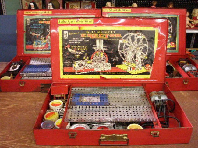 1950's A.C. Gilbert #8 1/2 Erector Sets: Three 1950's A.C. Gilbert Company #8 1/2 All Electric Erector sets. Condition: All appear to have have missing pieces, wear & loss on metal cases.