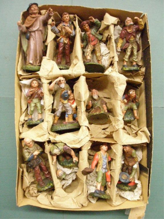 German Composition Nativity Figures: Early 20th c. boxed set of 12 German composition nativity figures. Condition: Three have broken off pieces, two have chips, others have wear, crazing & or cracking, box has wear & tearing.